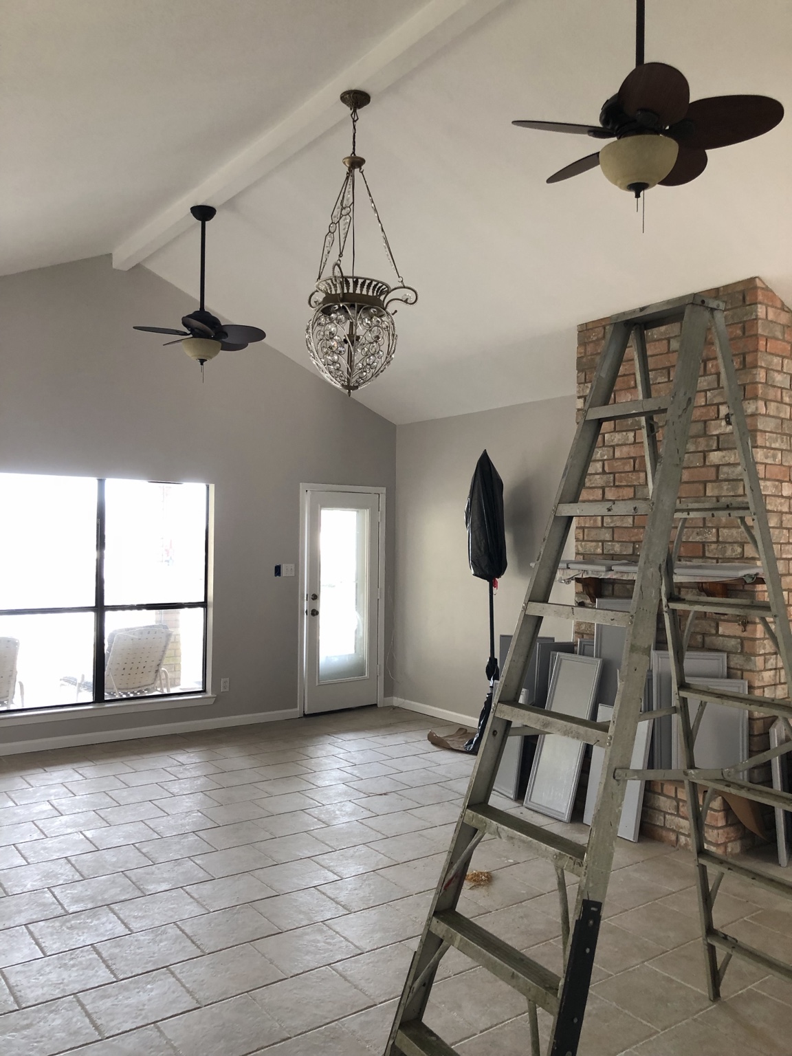 Interior painting and remodeling work with ladder
